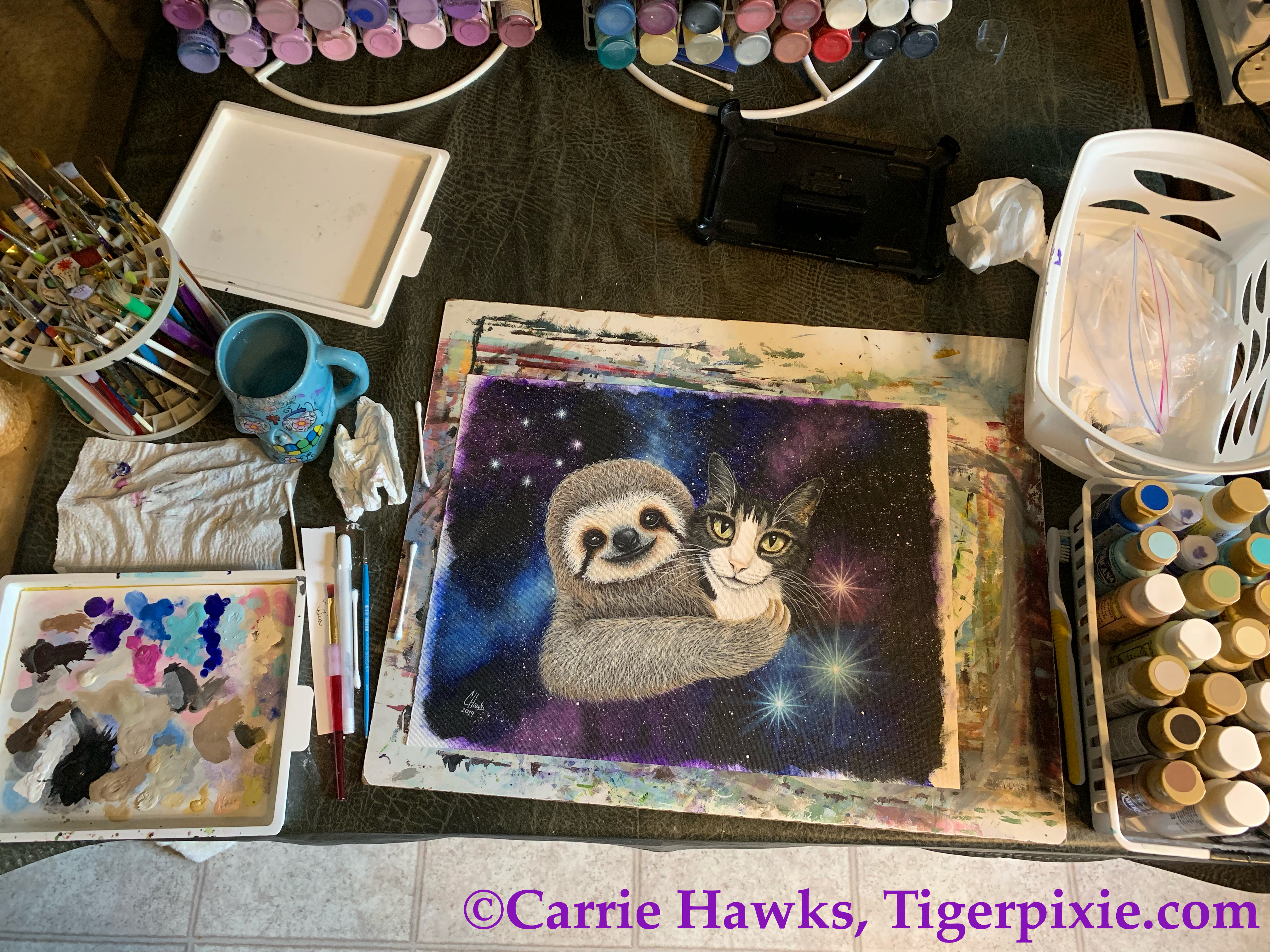 Carrie Hawks creating fantasy cat art